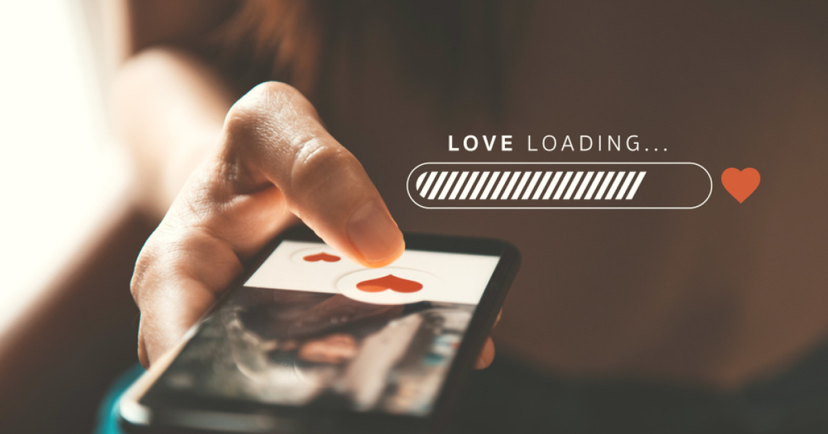  A person using a dating app with a loading bar that says Love Loading.